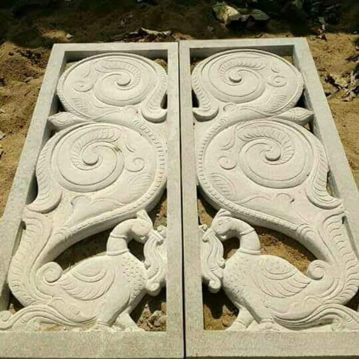 Small carved stone partition accent detail