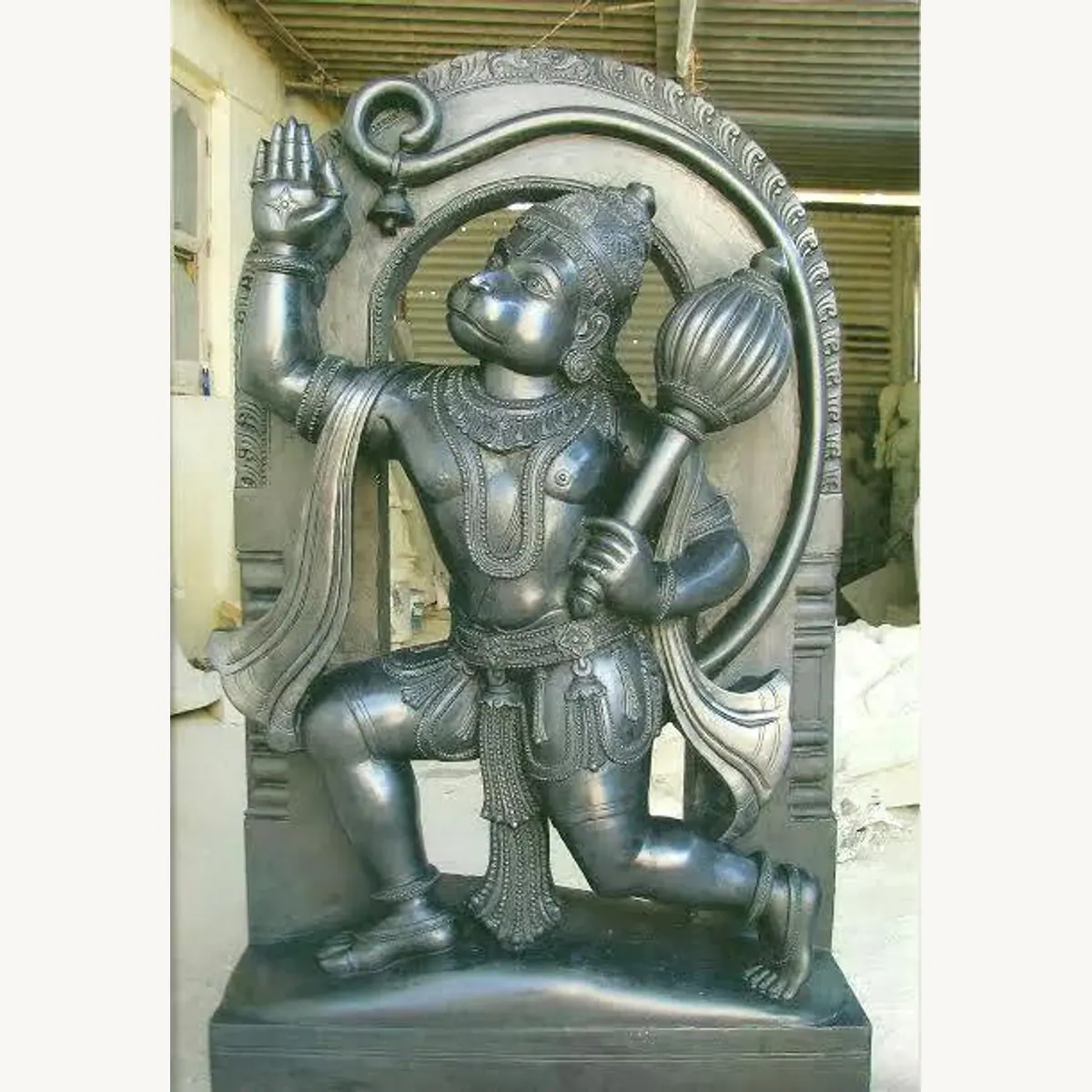 Hanuman idol carving detail in stone