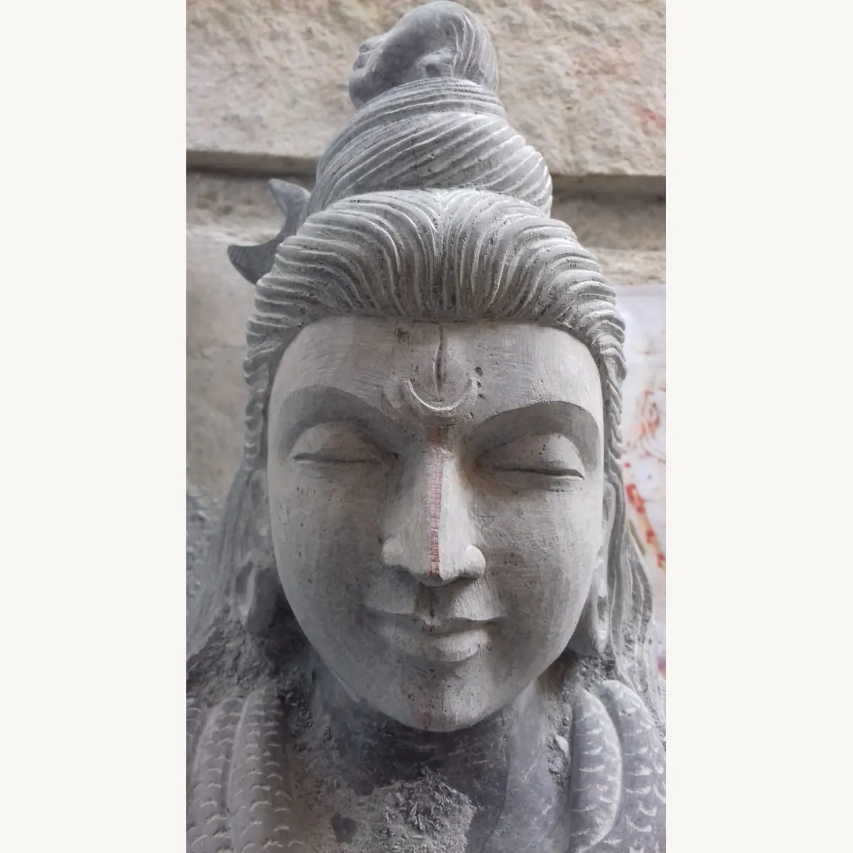 Stone deity idol carving detail from Shivarapatna